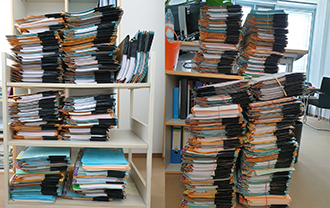 Piles of paper files